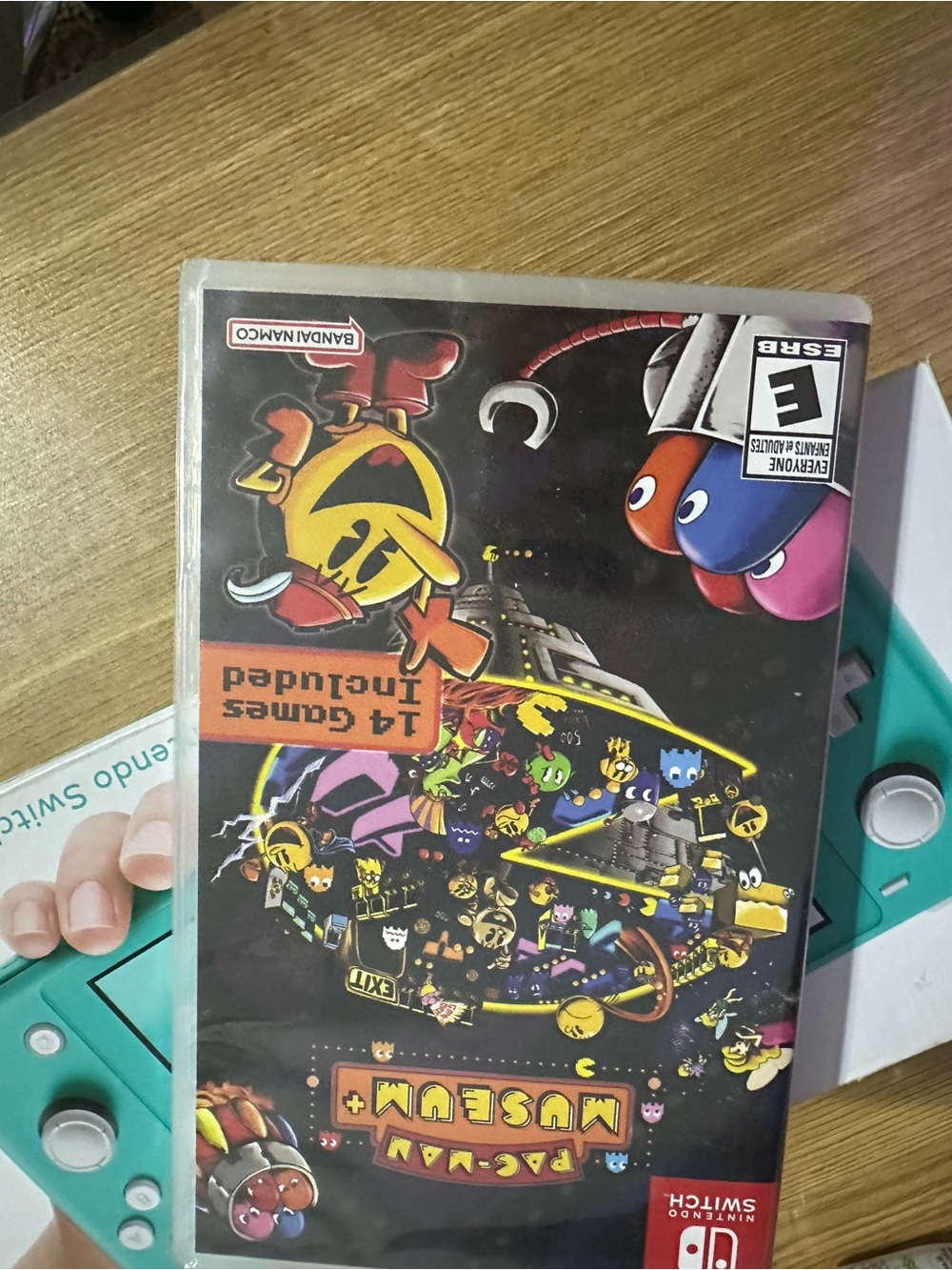 CLOSET  CLOSING BNIB Nintendo Switch LITE (Turquoise) with Pac-Man Museum+ Game - Picture 4 of 6